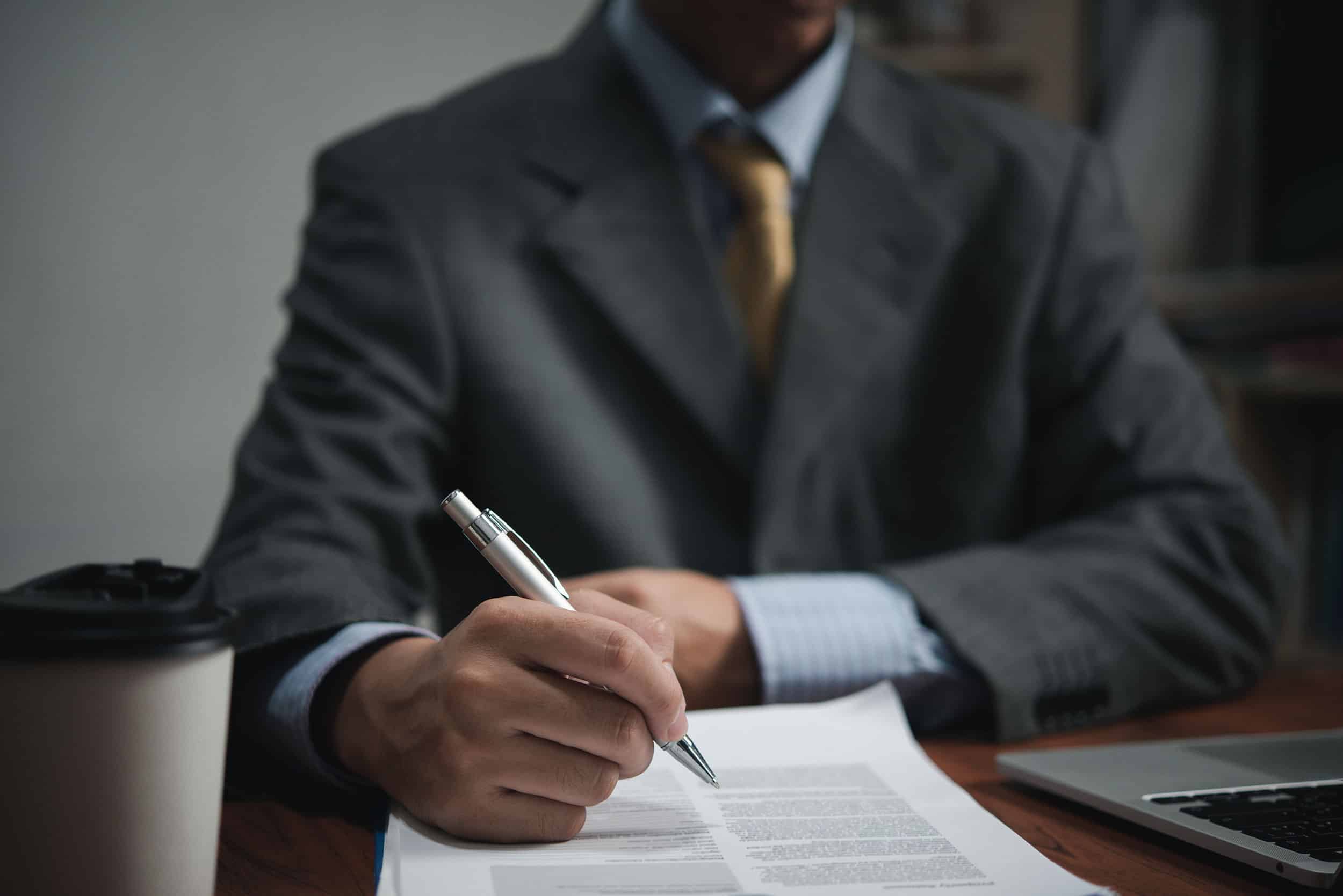 businessman-signs-contract-investment-professional-2023-05-11-20-49-49-utc-sized